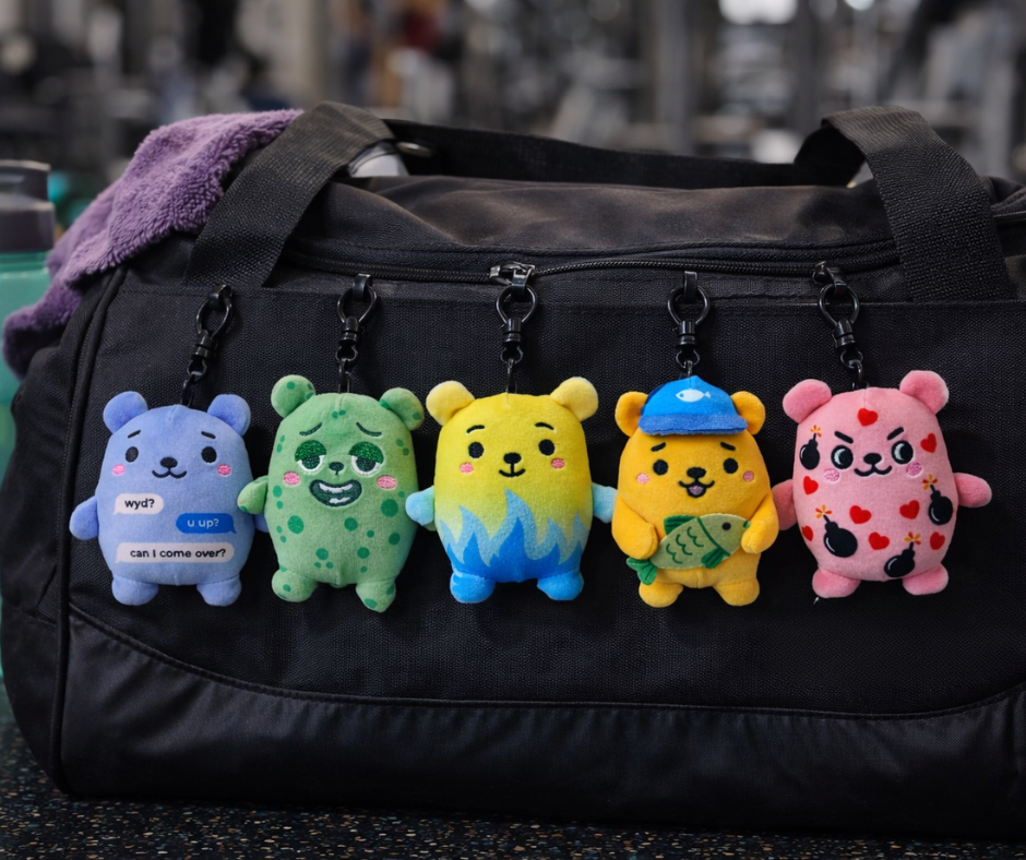 Bad Date Bears clip-ons clipped to a gym bag